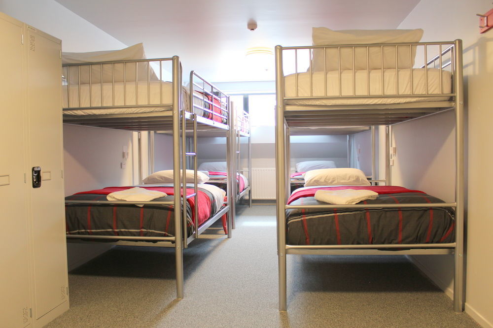 Ostello Urbanz Christchurch Esterno foto A typical hostel room